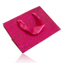 Geschenktasche, glänzende rosa Oberfläche, matte asymmetrische Herzen