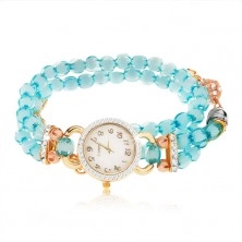 Uhr mit Armband aus durchsichtigen hellblauen Schmuckperlen, Zifferblatt mit Zirkonen
