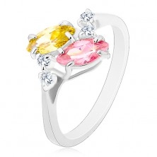 Ring in silberner Farbe, zwei glänzende rosa und gelbe Zirkoniakörner