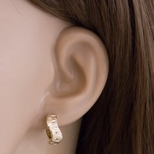 Ohrringe aus 585 Gold - glitzernde Welle mit Einschnitten aus Weißgold