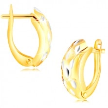 14K Gold Ohrringe - atypischer Bogen mit kleinen Körnern aus Weißgold verziert