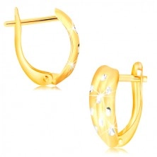 14K Gold Ohrringe – atypischer Bogen mit Kerben und Kreuzen aus Weißgold