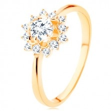 Ring aus 9K Gelbgold - klare Zirkoniasonne, schmale glänzende Arme
