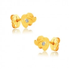 Ohrringe aus 375 Gelbgold - glänzender Elefant mit einem klaren Zirkon, Ohrstecker